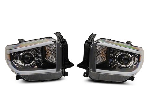 Raxiom 14-21 Toyota Tundra Axial Projector Headlights w/ SEQL LED Bar- Black Housing (Clear Lens)