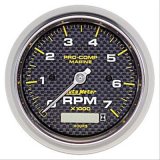 Autometer Marine Carbon Fiber Ultra-Lite 3-3/8in 7K RPM w/Hourmeter Tachometer Gauge thumbnail 1