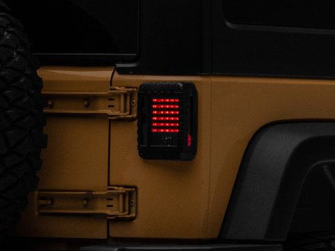 Raxiom 07-18 Jeep Wrangler JK LED Tail Lights- Black Housing (Smoked Lens) thumbnail 1