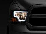 Raxiom 09-18 Dodge RAM 1500 LED Bar Headlights- Black Housing (Clear Lens) thumbnail 2