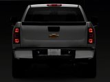 Raxiom 01-13 Chevrolet Silverado/GMC Sierra 1500 Axial Series LED License Plate Lamps- Smoked thumbnail 3
