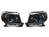 Raxiom 05-11 Toyota Tacoma Axial Series OE Replacement Headlights- Black Housing (Clear Lens) thumbnail 1