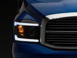 Raxiom 06-09 Dodge RAM 1500/2500/3500 Axial Headlights w/ SEQL LED Bar- Black Housing (Clear Lens) thumbnail 3