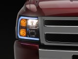 Raxiom 07-13 Chevrolet Silverado 1500 Axial Headlights w/ SEQL LED Bar- Black Housing (Clear Lens) thumbnail 1