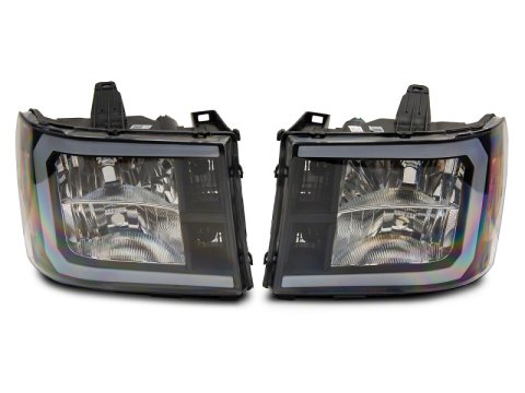 Raxiom 07-13 GMC Sierra 1500 Axial Series Headlights w/ LED Bar- Black Housing (Clear Lens)