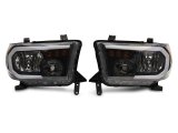 Raxiom 07-13 Toyota Tundra Axial Series Headlights w/ LED Bar- Black Housing (Clear Lens) thumbnail 1