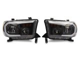 Raxiom 07-13 Toyota Tundra Axial Series Headlights w/ SEQL LED Bar- Black Housing (Clear Lens) thumbnail 1