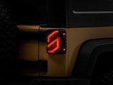 Raxiom 07-18 Jeep Wrangler JK Axial Series Trident LED Tail Lights- Black Housing (Clear Lens) thumbnail 1