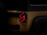 Raxiom 07-18 Jeep Wrangler JK Axial Series Trident LED Tail Lights- Black Housing (Smoked Lens) thumbnail 1