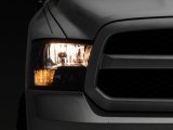 Raxiom 09-18 Dodge RAM 1500 Axial Series Euro Style Headlights w/ Dual Bulb Blk Housing (Clear Lens) thumbnail 1