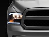 Raxiom 09-18 Dodge RAM 1500/2500/3500 Axial Headlights w/ SEQL LED Bar- Black Housing (Clear Lens) thumbnail 1