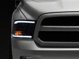 Raxiom 09-18 Dodge RAM 1500/2500/3500 Axial Headlights w/ SEQL LED Bar- Black Housing (Clear Lens) thumbnail 2
