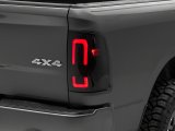 Raxiom 09-18 Dodge RAM 1500/2500/3500 Axial Series LED Tail Lights- Black Housing (Smoked Lens) thumbnail 1