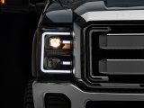 Raxiom 11-16 Ford F-250 Super Duty LED Projector Headlights - Black Housing (Clear Lens) thumbnail 1