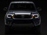 Raxiom 12-15 Toyota Tacoma Axial Projector Headlights w/ SEQL LED Bar- Black Housing (Clear Lens) thumbnail 4