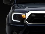 Raxiom 12-15 Toyota Tacoma Axial Series Headlights w/ LED Bar- Black Housing (Clear Lens) thumbnail 8