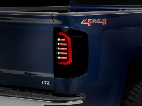 Raxiom 14-18 Chevrolet Silverado 1500 Axial Series LED Tail Lights- Black Housing (Smoked Lens) thumbnail 4