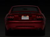Raxiom 99-04 Ford Mustang Axial Series Altezza Style Tail Lights- Black Housing (Smoked Lens) thumbnail 7