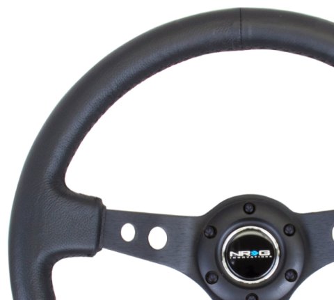 NRG Reinforced Steering Wheel (350mm / 3in. Deep) Blk Leather w/Blk Spoke & Circle Cutouts thumbnail 4