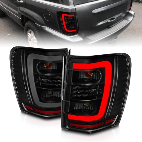 ANZO 1999-2004 Jeep Grand Cherokee LED Tail Lights w/ Light Bar Black Housing Smoke Lens thumbnail 2