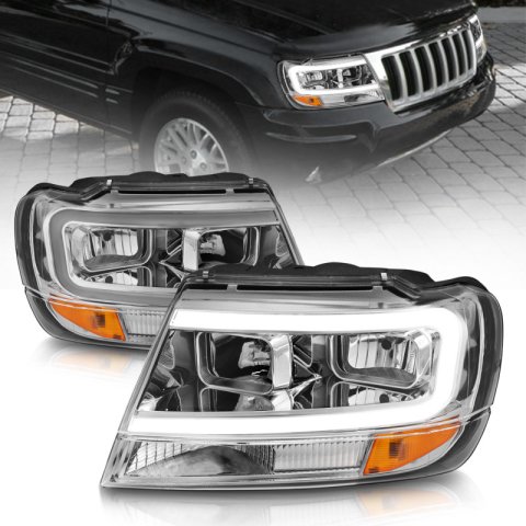 ANZO 1999-2004 Jeep Grand Cherokee Crystal Headlights w/ Light Bar Chrome Housing thumbnail 1