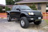 N-Fab Nerf Step 01-04 Toyota Tacoma Double Cab 5ft Bed - Gloss Black - W2W - 3in thumbnail 1