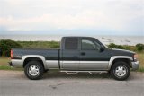 N-Fab Nerf Step 99-06 Chevy-GMC 2500/3500 Ext. Cab - Gloss Black - Cab Length - 3in thumbnail 2
