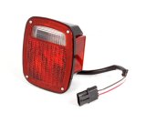 Omix Tail Light Black Housing RH 87-90 Jeep Wrangler thumbnail 1