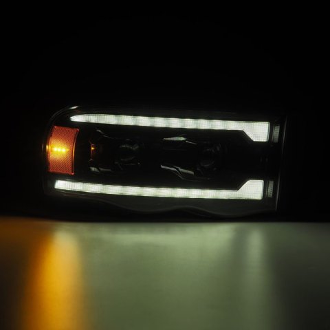 AlphaRex 02-05 Dodge Ram 1500 PRO-Series Projector Headlights Plank Style Alpha Black w/Seq Signal thumbnail 3