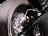 Cusco 23-25 Toyota GR Corolla Light Weight Rear Brake Caliper Bracket - Billet Aluminum thumbnail 1