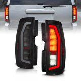 Anzo 07-14 Chevrolet Suburban / 07-14 GMC Yukon Black Full LED Tail Light Plank Style w/ Smoke Lens thumbnail 1
