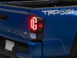 Raxiom 16-23 Toyota Tacoma XW Series Sequential LED Tail Lights- Black Housing- Clear Lens thumbnail 7