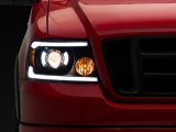 Raxiom 04-08 Ford F-150 Axial Series Projector Headlights with LED Bar- Black Housing- Clear Lens thumbnail 1